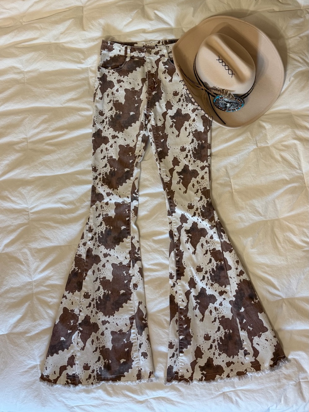 Western Cow Print High Rise Flare Jeans by Saints and Hearts